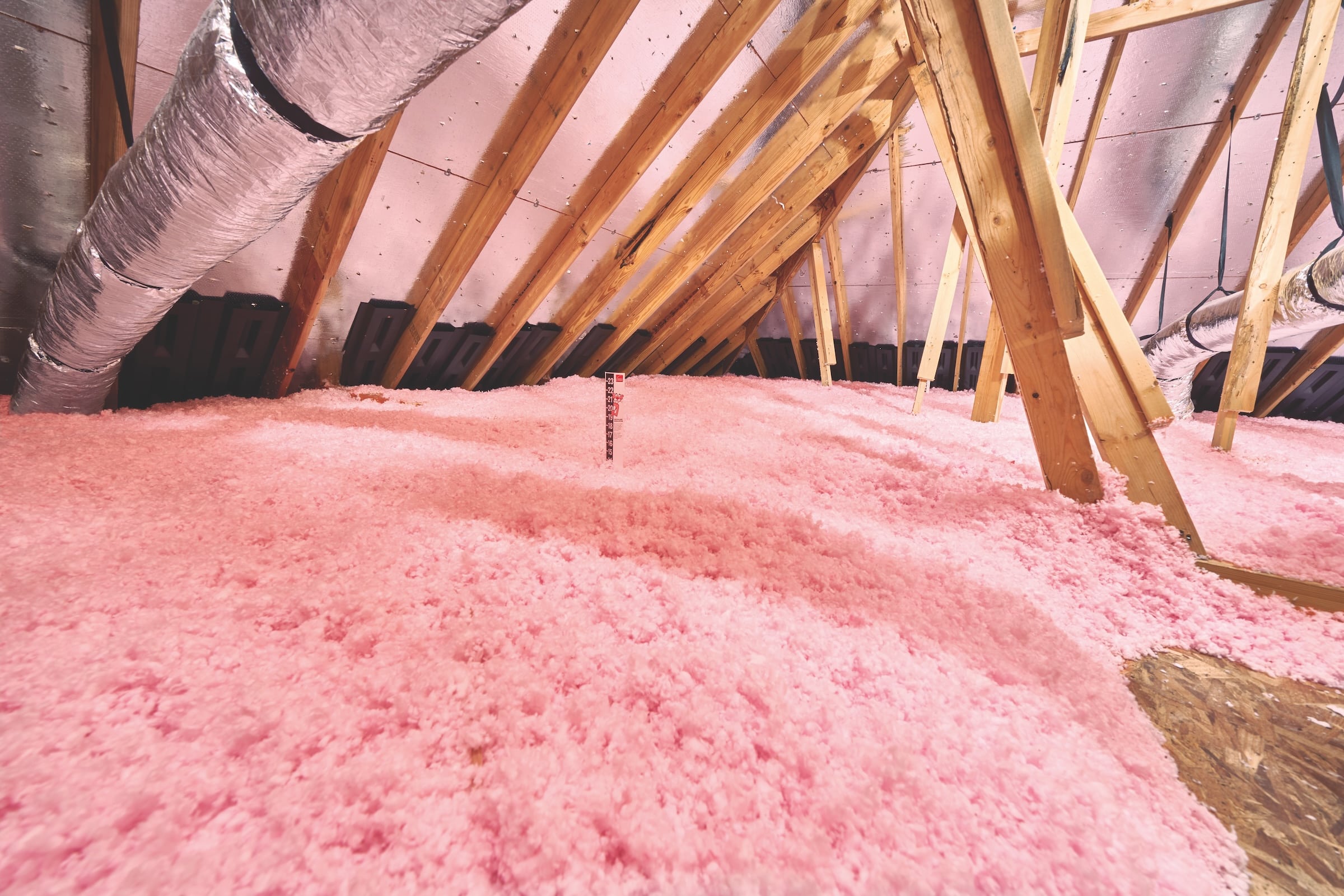 Installed loosefill attic insulation