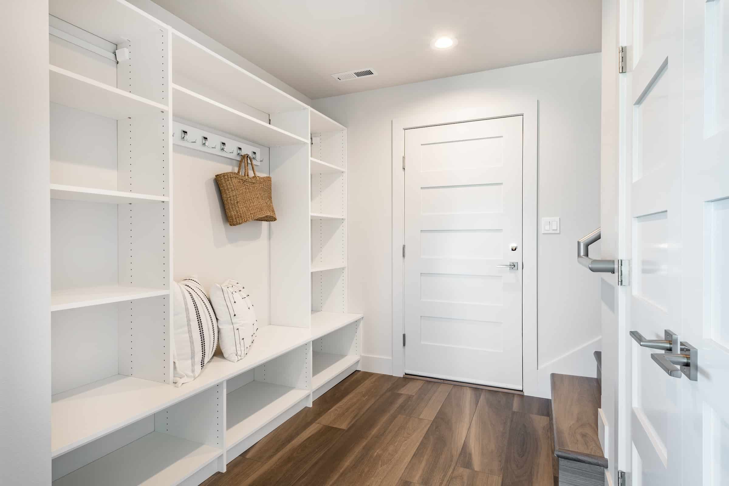 Wood shelving in mudroom