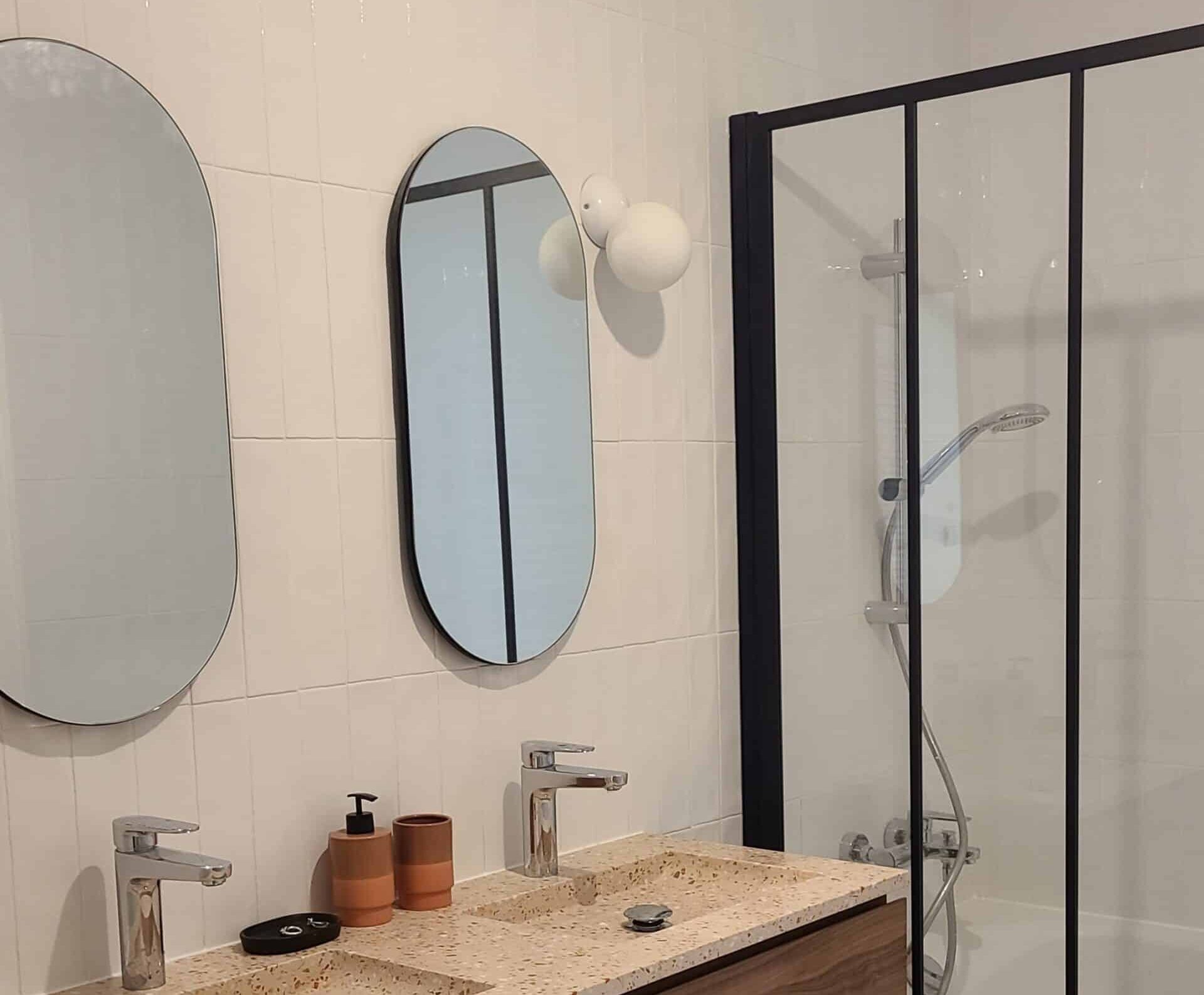 Modern,Bathroom,Interior,With,Double,Wooden,Vanity,,Oval,Mirrors,,And Framed shower in bathroom