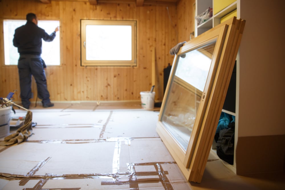 Technician installing windows